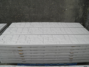 Rock faced panels reinforced with three bars of 6mm steel for extra strength.